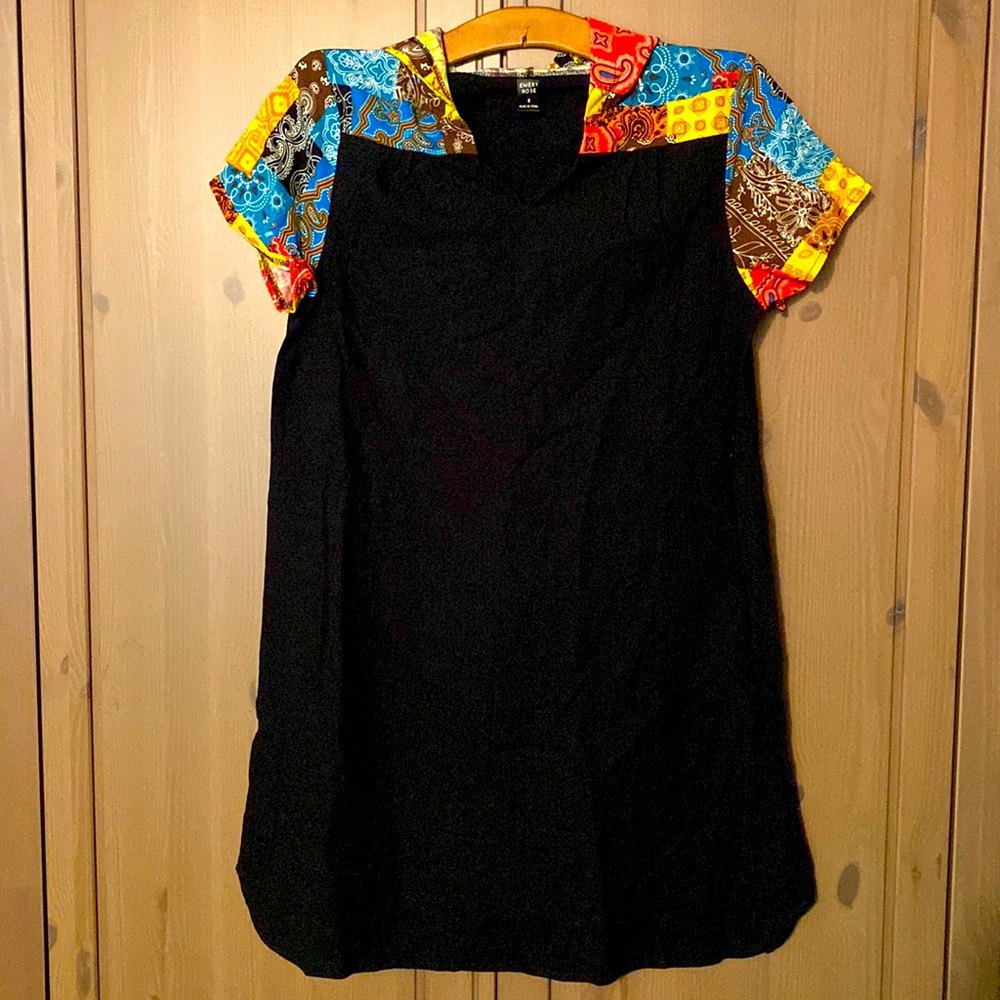Black dress with patchwork design to sleeves and hood